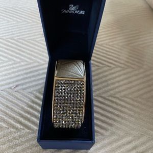 Swarovski crystal bracelet detailed with leather and crystals.